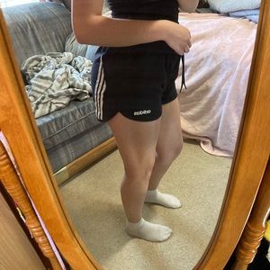 Black with white striped running shorts